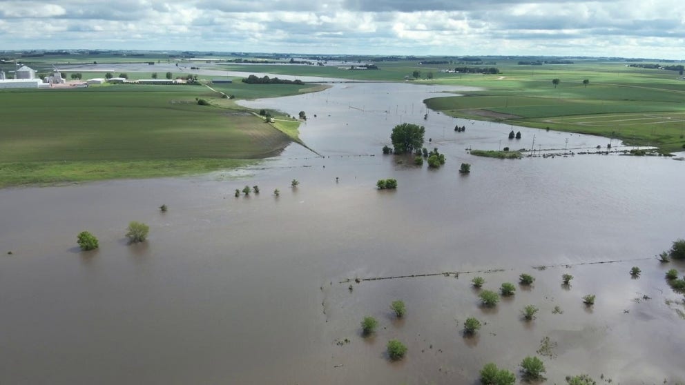 O’Brien County Emergency Management officials shared drone video showing the Floyd River in Sheldon, Iowa, overflowing its banks and flooding the community.